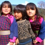 Bhutanese girls, enjoying their country's high level of Gross National Happiness (photo: Beth Whitman)