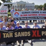 Environmentalists protest the proposed Keystone XL pipeline to Texas in front of the White House