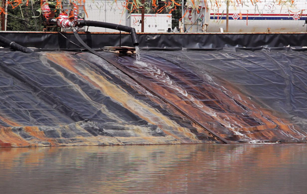 A storage pond in northeast BC containing fracking fluids (Image: Two Island Films)