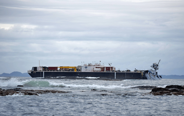 The Nathan E. Stewart fuel barge and part-sunken tug the morning of the incident (Jordan Wilson/Pacific Wild)