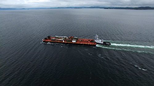 The Nathan E. Stewart on a typical voyage down the BC Coast (Pacific Wild)