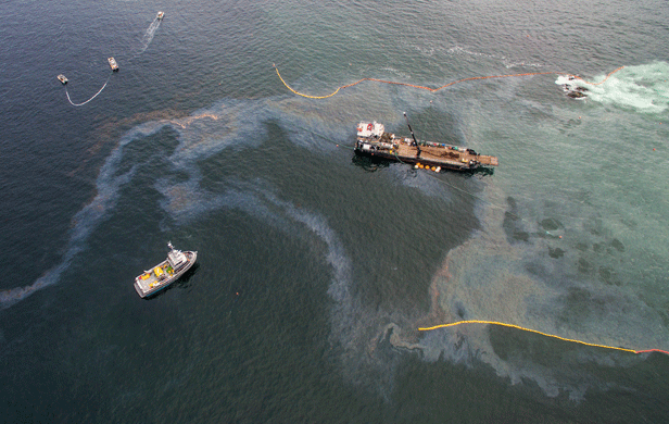 Booms intended to corral a fuel spill near Bella Bella are blown apart by stormy weather (Photo: Tavish Campbell)