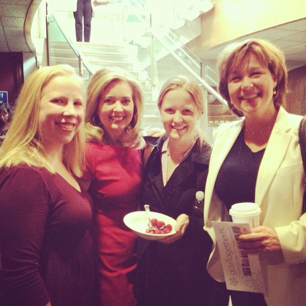 Pamela Martin (red dress) & Premier Clark (r) 2012 courtesy Amber Strocel via Flickr (CC BY SA, 2.0 Lilcense)